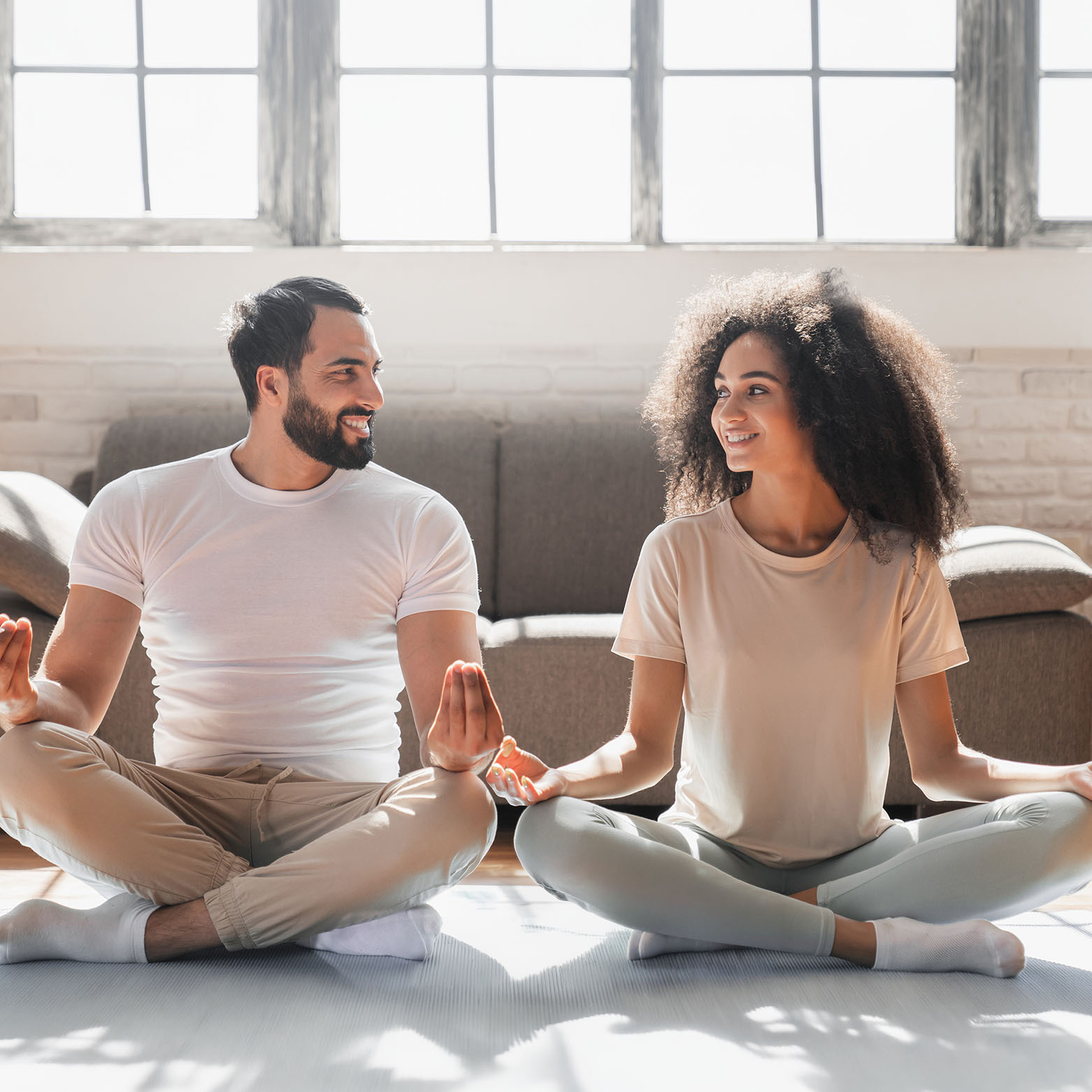 A couple doing yoga together