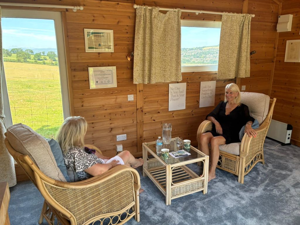 Two people sit in the office
